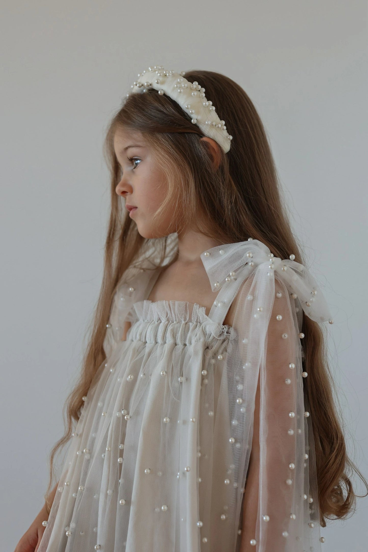 Nelia wear perl dress