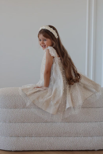 Nelia wear perl dress