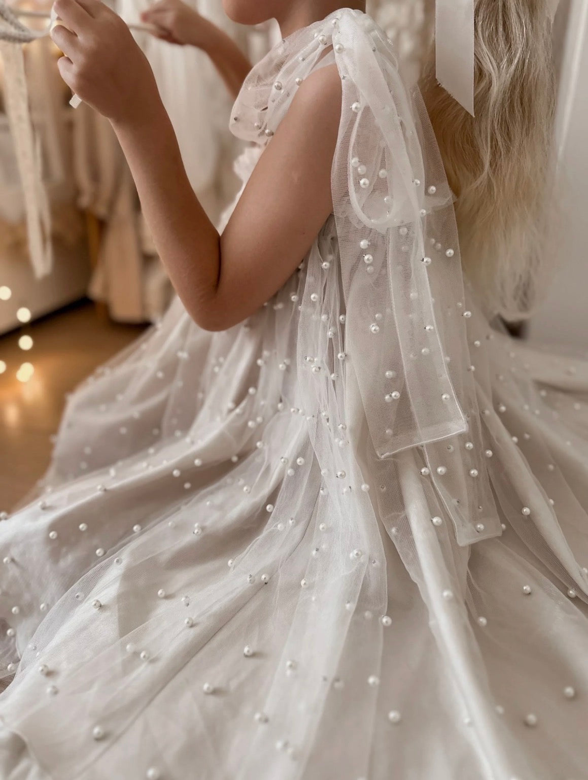 Nelia wear perl dress