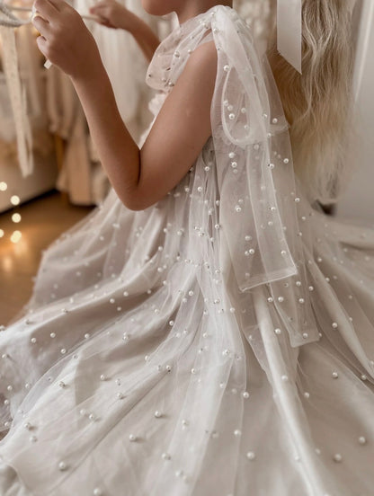 Nelia wear perl dress