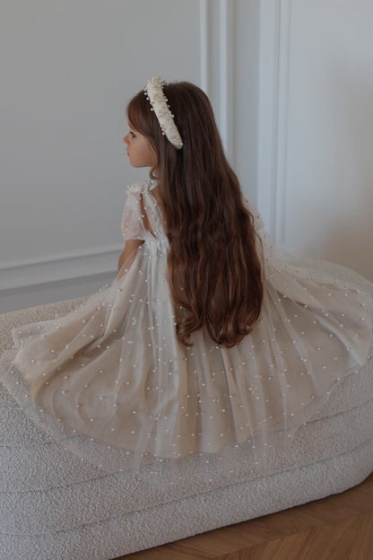 Nelia wear perl dress