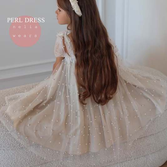 Nelia wear perl dress