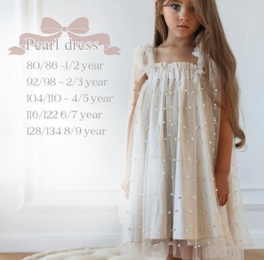 Nelia wear perl dress