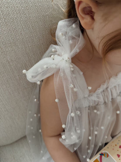 Nelia wear perl dress